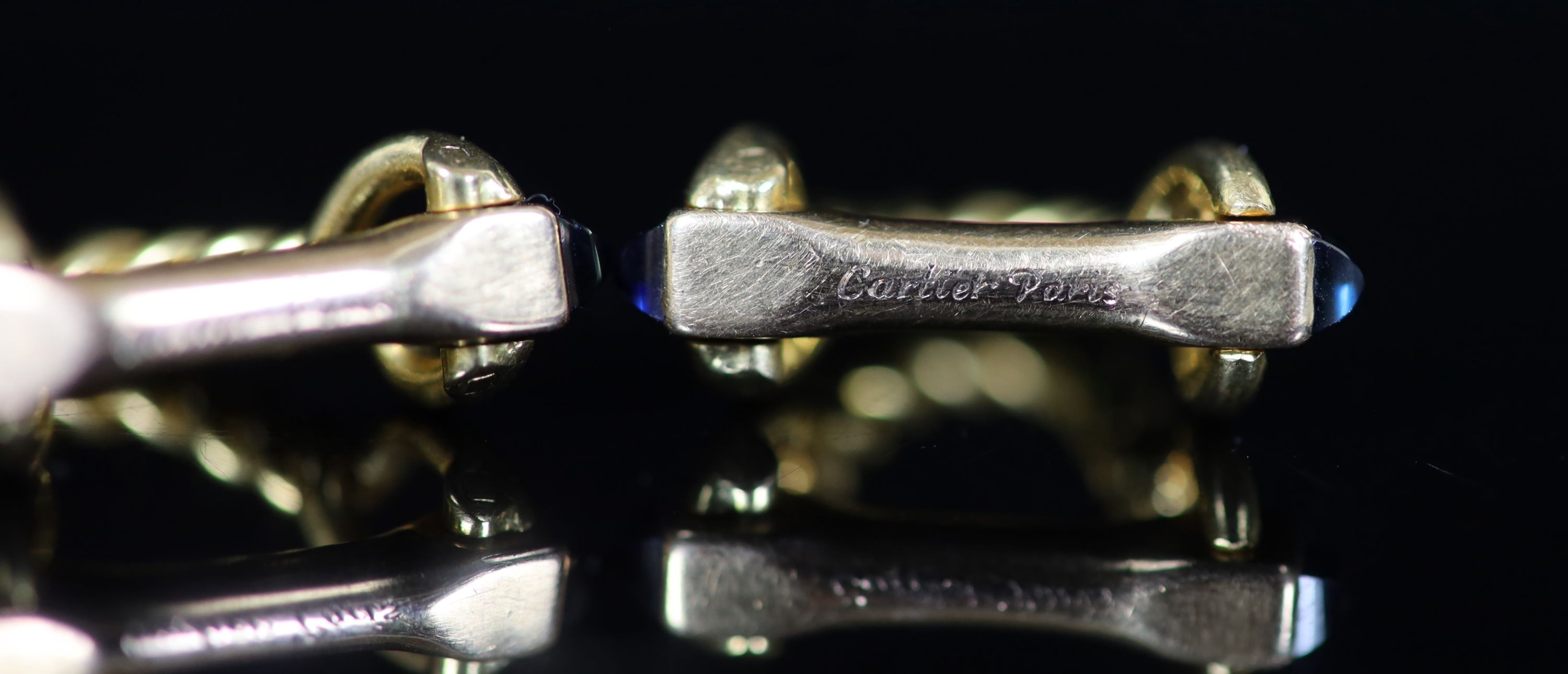 A pair of French Cartier 18ct gold and sapphire set cufflinks